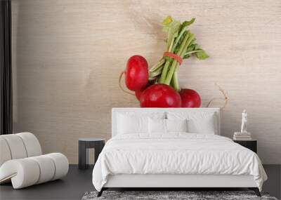 Red radish on wooden background Wall mural