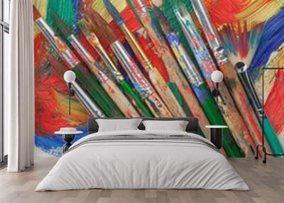 Brushes and paints for painting on an old background. Wall mural