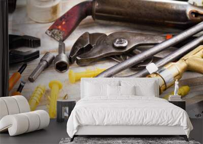 Different tools on the old background. Wall mural