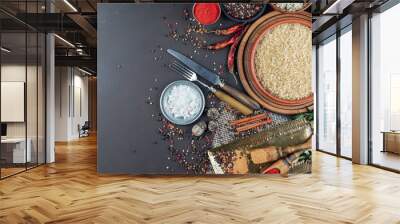 Spices and seasonings for cooking in the composition on the table Wall mural