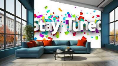 Stay tuned sign with colorful cut out ribbon confetti background. Wall mural