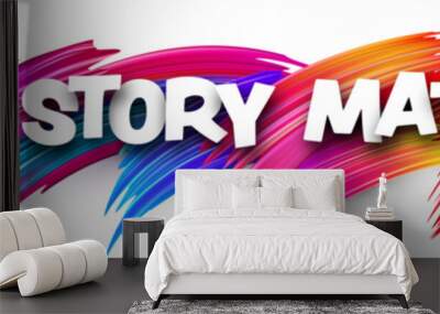 your story matters paper word sign with colorful spectrum paint brush strokes over white. Wall mural