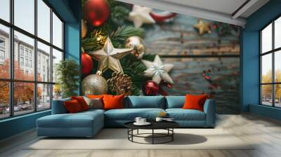 A festive arrangement of red and gold Christmas ornaments with pinecones and green branches, dusting festive spirit on a rustic wooden table. Wall mural