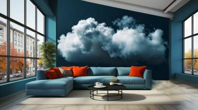 A fluffy white cloud floats gently in a dark blue sky, creating a serene and minimalist visual contrast with its environment. Wall mural