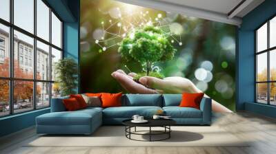 A hand gently cradling a small tree with a digital ecosystem, illustrating the fusion of nature and technology. Wall mural