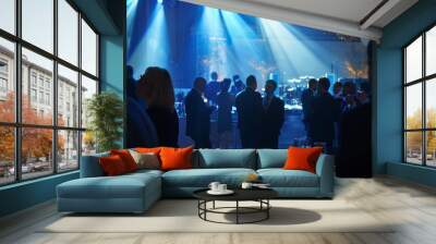 An elegantly lit evening event with guests mingling under soft blue lights, creating a sophisticated and ambient atmosphere. Wall mural