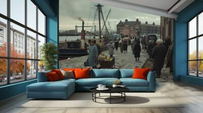 Cobblestone path beside the docks with people moving through a foggy, early morning, vintage scene. Wall mural