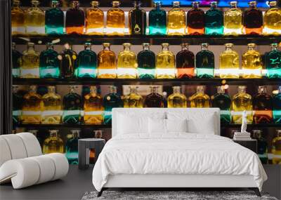 Colorful bottles on shelves Wall mural