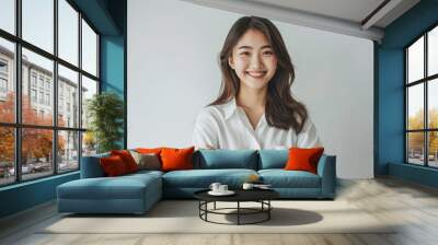 Asian Female Lifestyle: Young CEO in Casual Attire with Pleasing Expression and Arms Crossed, White Background Wall mural