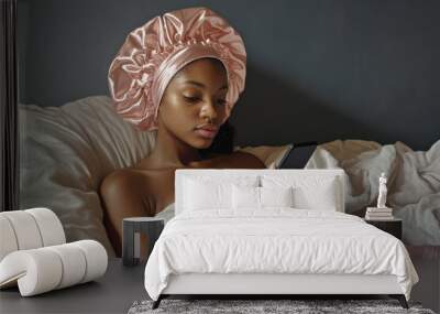 Bonnet Portrait: Young African American Girl Relaxing on Bed with Phone Wall mural