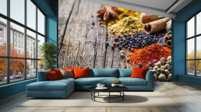 Food On Wood. Closeup of Colorful Spices on Old Wooden Table for Cooking Wall mural