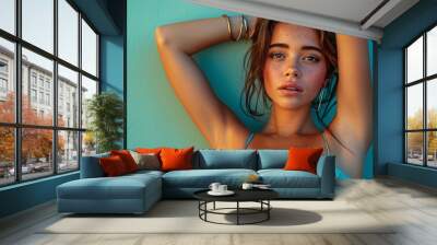 portrait of sexy female model in colorful lighting on isolated background Wall mural