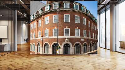 Architectural details of old brick wall facade of building in London Wall mural