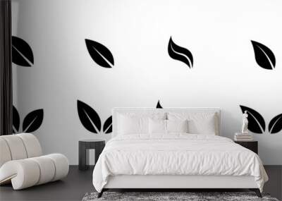 Black leaves icon set isolated on white background. Different leaves shapes. Foliage icons vector set. Eco leaves. Eco, bio sign logo. Vegeterian and vegan signs and sumbols. Vector graphic. Wall mural