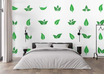 Set of isolated green leaf icons on white background. Various forms of green leaves of trees and plants. Abstract natural leaf icons. Elements for ecotypes and biotypes. Vector illustration. EPS 10 Wall mural