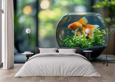 Vibrant orange goldfish swimming in a glass bowl on table, peaceful aquatic scene with plants, indoor fish tank decor, serene home atmosphere, goldfish pet care. Wall mural