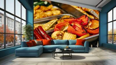 Assorted grilled vegetables and meat and sausages, showcasing a colorful breakfast. Wall mural