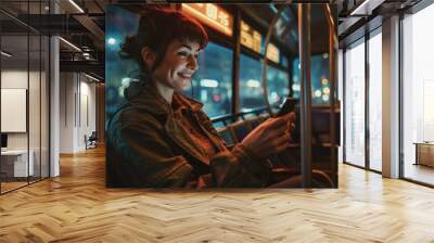 Caucasian female passenger sitting with smartphone in public transport in city at night Wall mural