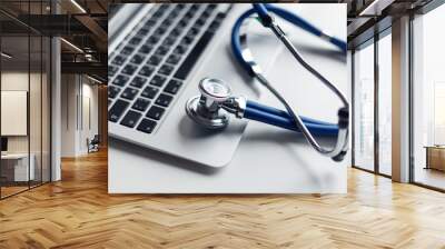 Stethoscope on laptop keyboard. Medicine concept Wall mural