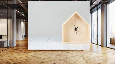 Wooden table clock in the shape of a house. Wall mural