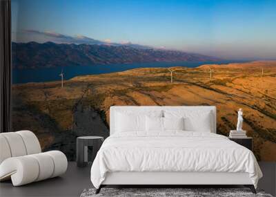 Aerial view of wind farm standing on the hill of island Pag surrounded by Adriatic sea, Croatia.  Wall mural