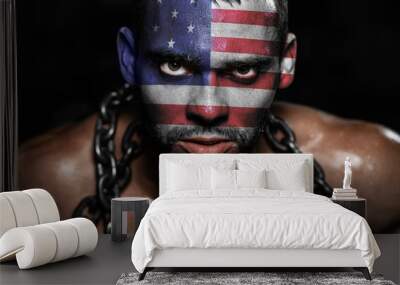 American flag on the face of a young man in chains Wall mural