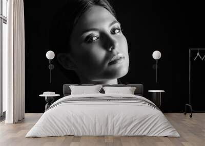 Black and white portrait of a beautiful young woman. Wall mural