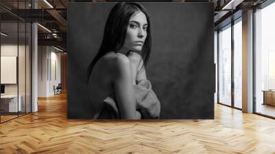 Black and white portrait of a beautiful young woman. Wall mural