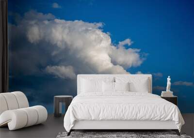 Dramatic blue sky with white clouds. Wall mural