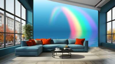 Rainbow reflecting in water surface. Wall mural