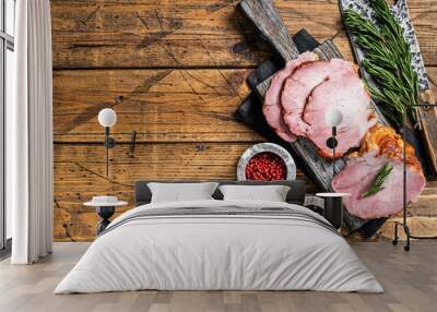 Cold Smoked pork sirloin meat with herbs on rustic board. Wooden background. Top view. Copy space Wall mural