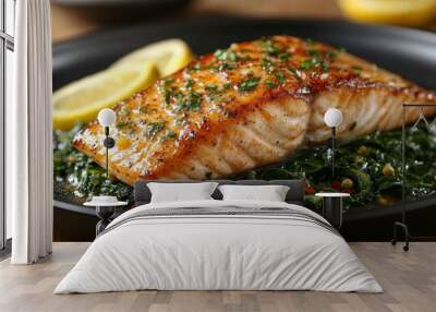 Delicious pan-seared red snapper on greens. Wall mural