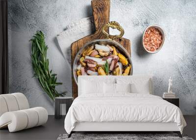 Mixed Seafood, variation of fresh mussels, clams, squid, octopus, shrimps and prawn in a skillet. White background. Top view Wall mural