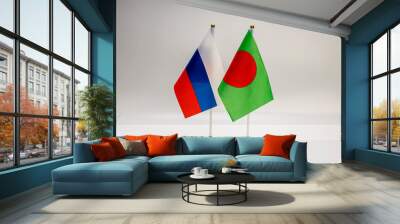 National flags of Russia and Bangladesh on a light background. State flags. Wall mural