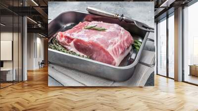 Raw pork loin fillet for cooking chop steaks with herbs and spices. Gray background. Top view Wall mural