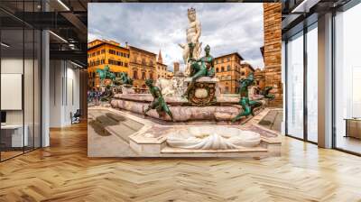 Fountain Neptune in Piazza della Signoria in Florence, Italy. Florence famous fountain. Famous architecture of the Renaissance in Florence center. Wall mural