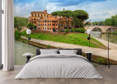 Tiber Island (Isola Tiberina) on the river Tiber in Rome, Italy. Wall mural