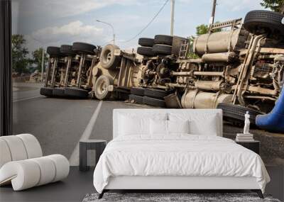 A view of an overturned truck on an highway in an accident. Wall mural