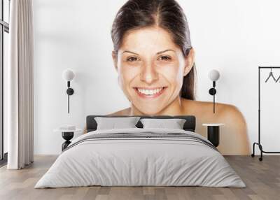 portrait of a young smiling woman without make up on a white Wall mural