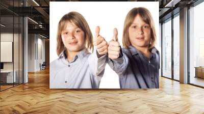 two twin brothers showing thumbs up Wall mural