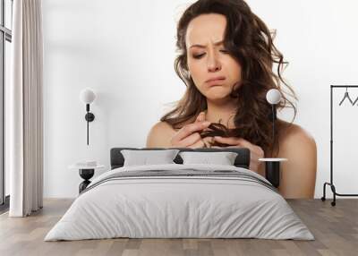 unhappy and sad girl because of her damaged hair Wall mural