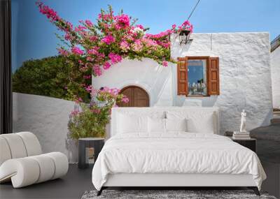 Facade of traditional white house in Lindos town at Rhodes island Wall mural