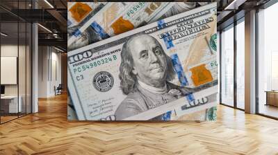 American cash dollars close up. A large amount of cash American dollars in cash paper bills. Finance concept Wall mural