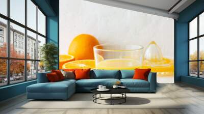 Freshly squeezed orange juice on a white background. Healthy eating. Diet. Vegetarian food. Wall mural