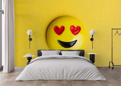 Smiley on a yellow background. Creative. Idea. Concept. Toy. Wall mural