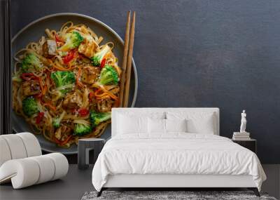 Udon noodles with tofu, broccoli, carrots, pepper and sesame. Healthy eating. Vegetarian food. Asian food. Wall mural