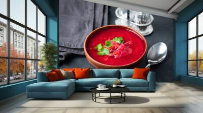 Borscht, Ukrainian beetroot soup in a bowl on elegant black table. Vegetarian red soup Wall mural