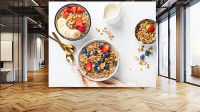 Breakfast oat granola bowl with fresh berries and oat milk, table top view, flat lay food photo composition Wall mural