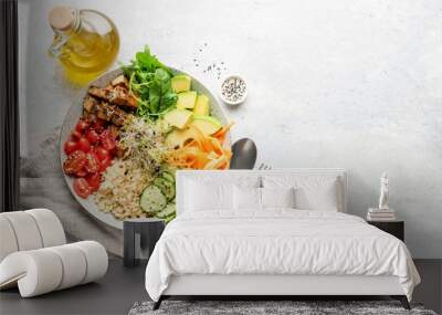 Vegetarian Vegan salad bowl or buddha bowl with grains, tofu, avocado, vegetables and greens. Balanced meal on grey concrete background. Top view, copy space Wall mural