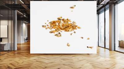 Shiny pieces of gold leaf, foil on a white background Wall mural